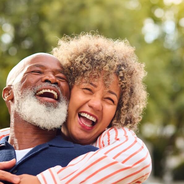 portrait-of-loving-senior-couple-hugging-outdoors-2024-04-18-00-03-08-utc (1)